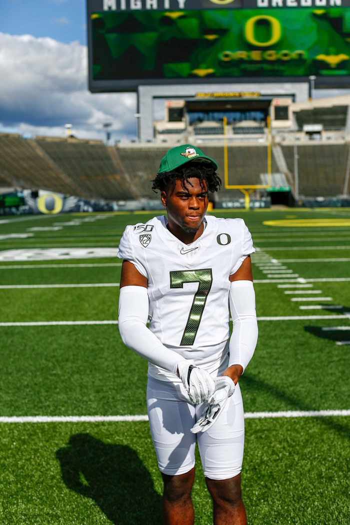 Landon Hullaby rocks a Duck hat and all-white uniforms during his official visit to Oregon.